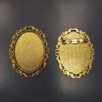 Рамка - основа для броши, 51х40мм (внутренний размер 40х30мм), с растительным узором, базовый материал - цинковый сплав, золотистого цвета с чернением, 2 шт.