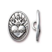 Пуговица, 19х13.5х5мм, TierraCast, на ножке, Святейшее Сердце, базовый материал - оловянный сплав, посеребрённая с чернением, 1 шт. Пуговица, 19х13.5х5мм, TierraCast, на ножке, Святейшее Сердце, базовый материал - оловянный сплав, посеребрённая с чернением, 1 шт.