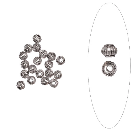 <p>
 Бусина в форме фонарика с бороздками. Изготовлена из бижутерного сплава с серебристым покрытием. Оттенок может отличаться от фотографии. Размер отверстия: 1,5 мм. Цена за 5 грамм (примерно 18 штук).
</p>