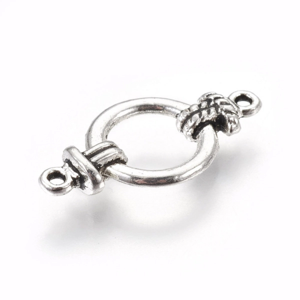 <p>Выпуклый двусторонний соединительный элемент круглой формы, хорошо подойдет под морскую тематику. Под античное серебро с чернением. Оттенок может отличаться от фотографии и в разных поставках. Цена за 1 шт.</p>