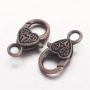 <p>Крупный карабин в форме сердца с двусторонним витым узором. Под античную медь. Оттенок может отличаться от фотографии и в разных поставках. Цена за 2 шт.</p>