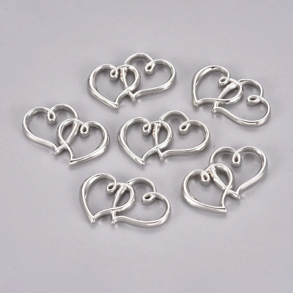 <p>Двусторонний металлический соединительный элемент в форме двух сердец. Цвет - античное серебро с чернением. Оттенок может отличаться от фотографии и в разных поставках. Цена за 5 шт.</p>