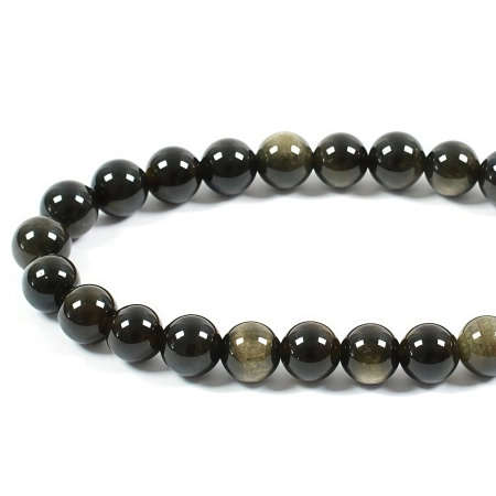 <p>Круглые каменные бусины, натуральный золотистый обсидиан. Бусины серо-черно-коричневые с золотым отливом. Оттенок может отличаться от фотографии. Бусины могут немного отличаться по форме и размеру. В низке около 62 бусин. Низки формируются без проверки каждой бусины на дефекты и без подбора по цвету. Цена за низку.</p>