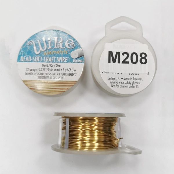 <p>Качественная не темнеющая золотистая проволока для создания украшений и других видов рукоделия. Марка Wire elements (ребрендинг марки Craft Wire pro-quality), цвет золотистый устойчивый к потемнению (Gold tarnish-resistant). Оттенок может отличаться от фотографии. Базовый материал - медь. Толщина 22 gauge (около 0,644 мм). Произведена в Пакистане для американской компании Bead Smith. Намотка может состоять из нескольких частей. Цена за катушку 8 ярдов (около 7.3 метра).</p>