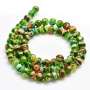 <p>Стеклянные бусины ручной работы, выполнены в технике миллефиори. Зелёные бусинки с разноцветными узорами. Оттенок может отличаться от фотографии и в разных поставках. Цена за низку около 65 бусин (низки формируются без проверки каждой бусины на дефекты).</p>