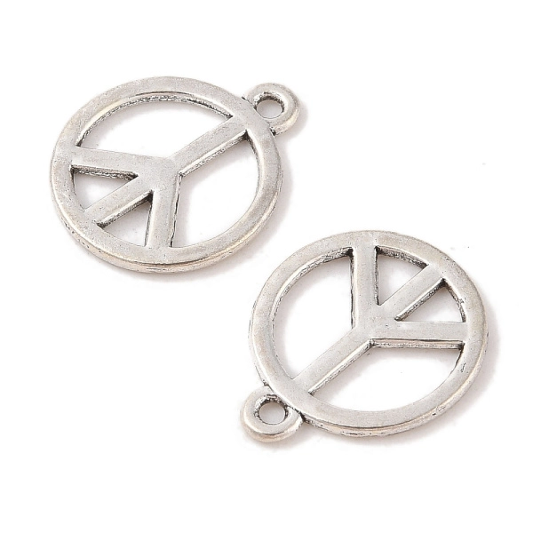 <p>Двусторонняя подвеска из тибетского серебра в форме пацифистского знака (peace symbol). На фотографии показана лицевая и тыльная стороны. На подвесках данной партии возможны небольшие неровности на покрытии, пятнышки. Базовый материал - бижутерный металлический сплав, покрытие серебристое с чернением. Оттенок может отличаться от фотографии и в разных поставках. Цена за 10 шт.</p>