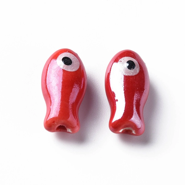 <p>Бусина из фарфора - стилизованная рыбка ручной работы. Бусины сделаны вручную, могут отличаться по форме, рисунку и размеру. Размер отверстия около 1-2 мм. Возможны небольшие неровности и царапинки, отверстие может быть сделано не очень аккуратно. Оттенок может отличаться от фотографии и в разных поставках. Цена за 5 бусин.</p>