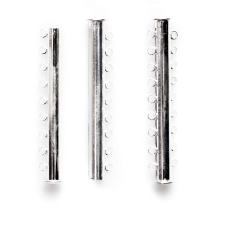 Застежка, 50х10мм, магнитная трубочка-слайдер на девять нитей, базовый материал - латунь, под серебро, 1 шт. Застежка, 50х10мм, магнитная трубочка-слайдер на девять нитей, базовый материал - латунь, под серебро, 1 шт.