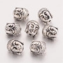 <p>
 Двусторонняя металлическая бусина - голова Будды. Стиль тибетское серебро. Оттенок может отличаться от фотографии и в разных поставках. Диаметр отверстия около 1.4 мм. Цена за 10 шт.
</p>