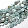 <p>Круглые бусины-пластинки из натурального тонированного перламутра приглушённого зеленовато-сине-голубого цвета. На бусинах есть темные пятна, возможны щербинки естественного происхождения. Бусины могут немного отличаться по форме и размеру. Оттенок может отличаться от фотографии и от партии к партии. Цена за 1 низку длиной около 36 см (примерно 25 бусин, низки формируются без проверки каждой бусины на дефекты).</p>