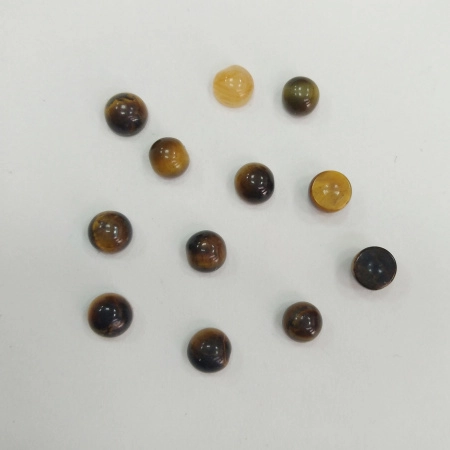<p>
Миниатюрный каменный кабошон из натурального тигрового глаза. Оттенок может отличаться от фотографии. Размер и форма могут немного отличаться от заявленных. Кабошоны отличаются по цвету и рисунку, а также по толщине: при заказе нескольких штук мы постараемся подобрать похожие. Цена за 2 шт.
</p>