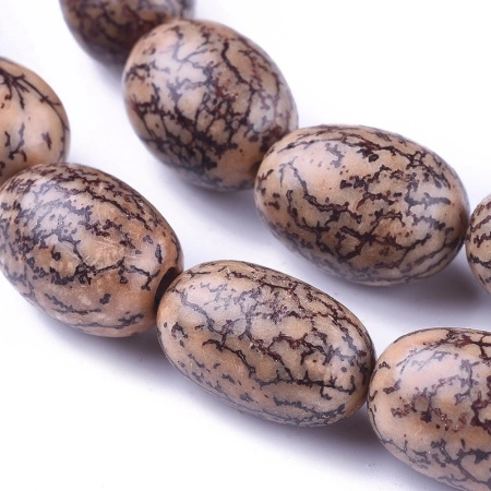 <p>Бусины из плодов бетеля, овальной формы. Могут отличаться по цвету, форме и размеру. Оттенок может отличаться от фотографии и в разных поставках. Цена за низку 40 см, около 25 бусин (низки формируются без проверки каждой бусины на дефекты).</p>