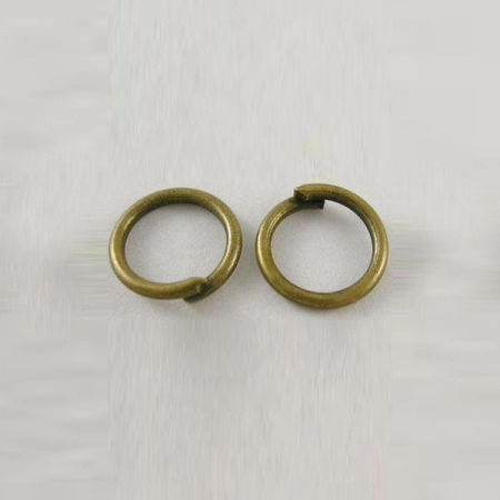 Соединительное колечко, 7мм (толщина 1.0мм, внутренний размер 5мм), базовый материал - латунь, бронза, 10 грамм