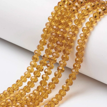 <p>Бюджетные миниатюрные стеклянные граненые бусины - рондели (абакусы) янтарно-бежевого цвета. Бусины могут немного отличаться по форме и размеру. Оттенок может немного отличаться от фото. Цена за низку около 155 бусин.</p>