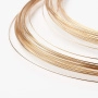 <p>Проволока с памятью для колье золотого цвета. Оттенок может отличаться от фотографии и от партии к партии.
Диаметр около 11.5 см (может отличаться от заявленного на +-5мм). Толщина проволоки 0.6-0.7 мм. Цена за 25 витков. Максимальная длина одним куском - 25 витков.</p><p>ВНИМАНИЕ: на покрытии возможны темные пятнышки.</p>