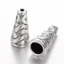 Конус, 18х8мм (внутренний размер 6.7мм), с кельтским узором, базовый материал - цинковый сплав, стиль тибетское серебро, 1 шт. <p>Конус с плетеным узором в кельтском стиле. Можно использовать как обниматель, концевик для кисточки или бисерных жгутов. Оттенок может отличаться от фотографии и в разных поставках. Цена за 1 шт.</p>
