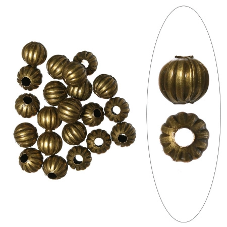 <p>
 Бусины с бороздками в винтажном стиле. Цвет бронзовый, оттенок может отличаться от фотографии и в разных поставках. Диаметр отверстия около 2.8 мм. Цена за 10 грамм (около 16 бусин, фасуются на вес без проверки на дефекты).</p>