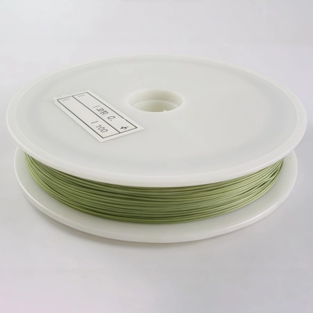 <p>Бюджетный ювелирный тросик (ланка). Цвет оливково-зеленый. Цена за катушку 50 метров. Толщина может отличаться от указанной на плюс-минус 0,05 мм. Тросик на катушке может состоять из нескольких кусков.</p>