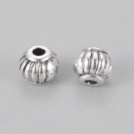 <p>
 Бусина в форме фонарика с бороздками. Изготовлена из бижутерного сплава с серебристым покрытием. Оттенок может отличаться от фотографии. Размер отверстия: 1,5 мм. Цена за 5 грамм (примерно 18 штук).
</p>