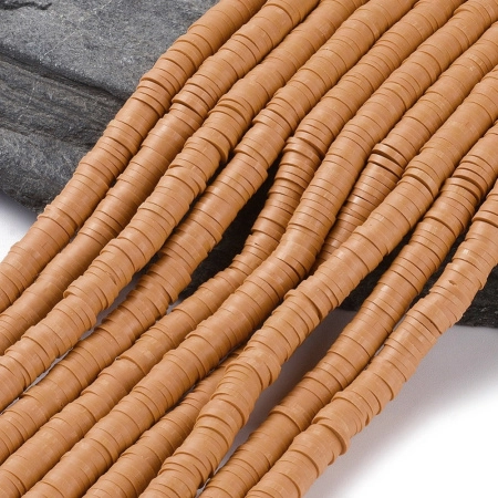 <p>Плоские круглые бусины - чипсы (диски, рондели heishi) ручной работы из полимерной глины (пластики). Бусины могут немного отличаться по форме и размеру. Оттенок может отличаться от фотографии. Бусины довольно мягкие, гибкие, напоминают каучук. Цвет: светло-коричневый (от горчичного до насыщенно бежевого в разных поставках). Цена за низку длиной около 43 см, около 350-400 бусин.</p>