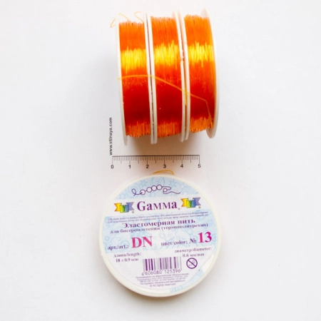 Нить - резинка для браслетов, 0.6мм, светло-оранжевая, катушка, 18 метров Нить - резинка для браслетов, 0.6мм, светло-оранжевая, катушка, 18 метров