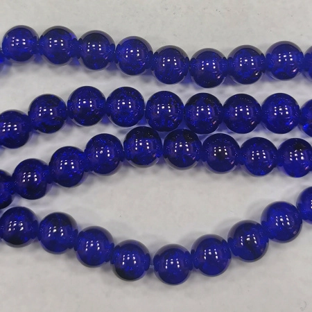 <p>Стеклянные бусины с эффектом кракелюра. Гладкие шарики кракле (с трещинками внутри). Цвет яркий тёмно-синий. За счёт насыщенного цвета трещинки почти не видно. Оттенок может отличаться от фотографии и в разных поставках. Бусины окрашены сверху, покрытие может быть не очень стойким, возле отверстий бусины могут быть немного потёрты. Бусины могут незначительно отличаться по размеру и форме. Длина низки около 79 см, в низке около 79 бусин. Цена за одну низку.</p>