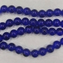 <p>Стеклянные бусины с эффектом кракелюра. Гладкие шарики кракле (с трещинками внутри). Цвет яркий тёмно-синий. За счёт насыщенного цвета трещинки почти не видно. Оттенок может отличаться от фотографии и в разных поставках. Бусины окрашены сверху, покрытие может быть не очень стойким, возле отверстий бусины могут быть немного потёрты. Бусины могут незначительно отличаться по размеру и форме. Длина низки около 79 см, в низке около 79 бусин. Цена за одну низку.</p>