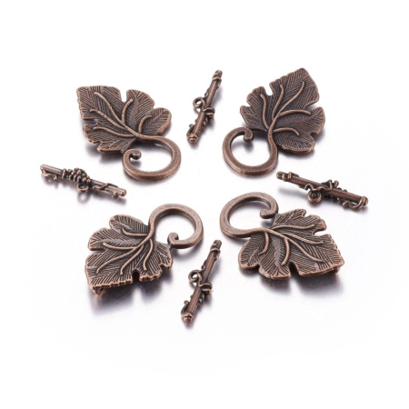 <p>Крупная эффектная застежка-тогл в форме виноградного листа с гроздью ягод винограда. Под античную медь. Оттенок может отличаться от фотографии. Цена за 5 шт.</p>