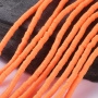 <p>Плоские круглые бусины - чипсы (диски, рондели heishi) ручной работы из полимерной глины (пластики). Бусины могут немного отличаться по форме и размеру. Оттенок может отличаться от фотографии. Бусины довольно мягкие, гибкие, напоминают каучук. Цвет: ярко-оранжевый. Цена за низку длиной около 43 см, около 350-400 бусин.</p>