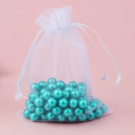 <p>Подарочный мешочек из белой органзы. В мешочек вставлена белая ленточка для завязывания. Мешочки могут немного отличаться по форме и размеру, быть слегка помятыми. Оттенок может отличаться от фотографии и в разных поставках. Цена за 10 шт.</p>