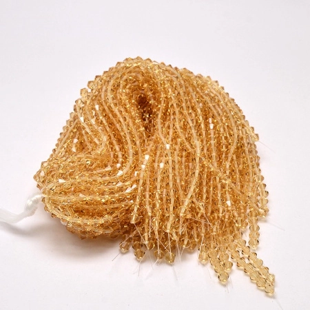 Бусины стеклянные, 4-5мм, граненые, биконусы, персиково-бежевые, 85 шт., низка <p>Бюджетные стеклянные граненые бусины - биконусы янтарно-бежевого цвета. Бусины могут немного отличаться по форме и размеру. Оттенок может немного отличаться от фотографии и в разных поставках. Цена за низку около 85 бусин (низки формируются без проверки каждой бусины на дефекты).</p>