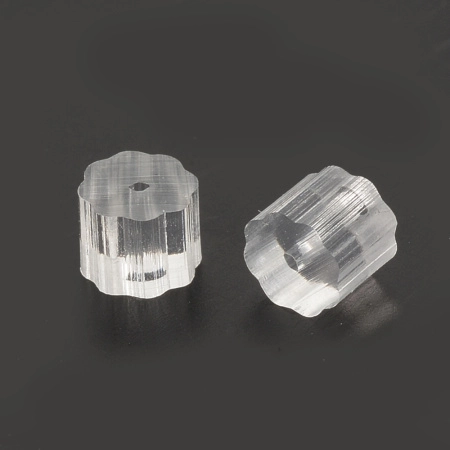 <p>Бюджетные прозрачные застежки - шестеренки для серег-гвоздиков (пуссет). Выполнены из мягкого пластика. Крепко держат сережку в ухе. Также могут использоваться как заглушки для обычных сережек без замка (открытых швенз - крючков). Оттенок может отличаться от фотографии. Заглушки могут немного отличаться по форме и размеру. Цена за упаковку 5 грамм (около 50 пар, фасуются на вес без проверки на дефекты и пересчёта).</p>