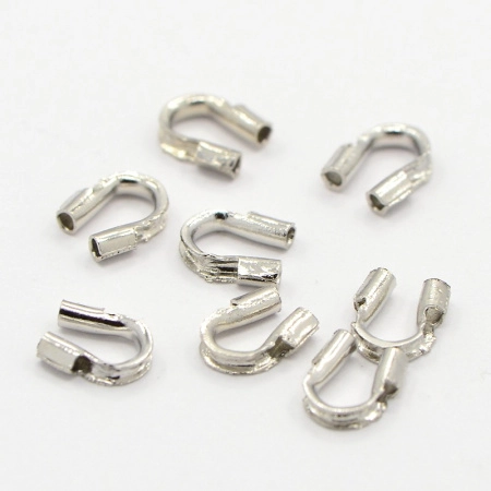 Концевики, 5х4мм (внутренний размер 0.7мм), защитные скобы, базовый материал - латунь, стального цвета, 2 грамма