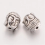 <p>
 Двусторонняя металлическая бусина - голова Будды. Стиль тибетское серебро. Оттенок может отличаться от фотографии и в разных поставках. Диаметр отверстия около 1.4 мм. Цена за 10 шт.
</p>