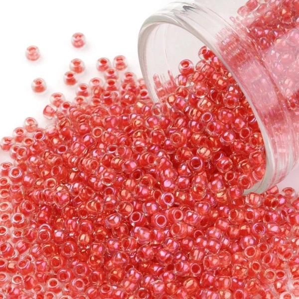 <p>
 Японский бисер TOHO Round (круглый Тохо), размер 11/0 (2.2 мм). Кристально-прозрачный глянцевый бисер, окрашенный изнутри в коралловый цвет (Inside Color Luster Crystal/Coral Lined). Оттенок может отличаться от фотографии. Цена за 10 грамм. Среднее количество бисерин в 1 грамме Toho 11/0 от 70 до 120 штук, может сильно варьироваться в зависимости от вида бисера.
</p>