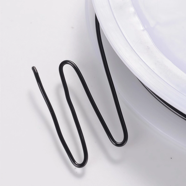 <p>Медная проволока с покрытием черного цвета. Используется для создания украшений, изготовления деревьев и цветов из бисера и камней, и прочих декоративных работ. Намотка может состоять из нескольких частей. Цена за катушку, примерно 3 метра.</p>