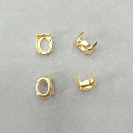 Оправа с цапами, 10х8мм, пришивная, форма овал, базовый материал - латунь, золотистого цвета, 20 шт. <p>На оправах возможны пятнышки. Пришивная оправа с цапами для кристалла. Форма овал, размер 10*8 мм. Цапы подходят для кристаллов Swarovski. Базовый материал - латунь, покрытие золотого цвета. Оттенок может отличаться от фотографии и от партии к партии. Цена за 20 шт.</p><p>ВНИМАНИЕ: задняя сторона может быть немного разной в разных поставках (см. фото).</p>