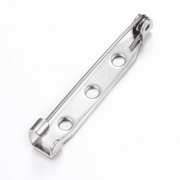 <p>Основы (замочки) для брошек из нержавеющей стали. Подходят и для приклеивания декора, и для пришивания (на платформе имеется три отверстия). Оттенок может отличаться от фотографии. Цена за 5 штук.</p>