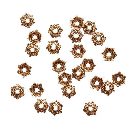 <p>Шапочка для бусин в форме стилизованного цветочка. Цвет золотистый с чернением, оттенок может отличаться от фотографии. Цена за 5 грамм (около 24 штук, фасуются без проверки на дефекты).</p>