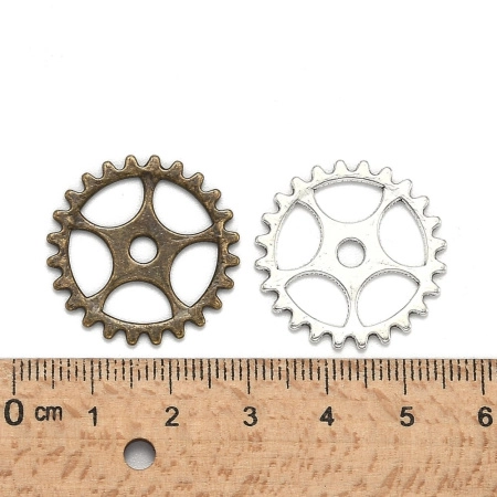 <p>Набор декоративных элементов - шестеренок из металлического сплава. Эти шестеренки могут также использоваться как подвески или соединительные элементы. Отлично подойдут для украшений в стиле стимпанк (steampunk). Возможные цвета: золото, бронза, медь, тибетское серебро. Оттенок может отличаться от фотографии и в разных поставках. Цена за 20 шестерёнок случайного цвета.</p>