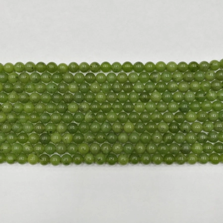 <p>Бусины из натурального камня - канадского нефрита качества А. Бусины могут немного отличаться по форме и размеру. Оттенок может немного отличаться от фотографии. Длина низки 18-19 см, в низке около 29 бусин. Низки формируются без проверки на дефекты каждой бусины. Цена за низку.</p>