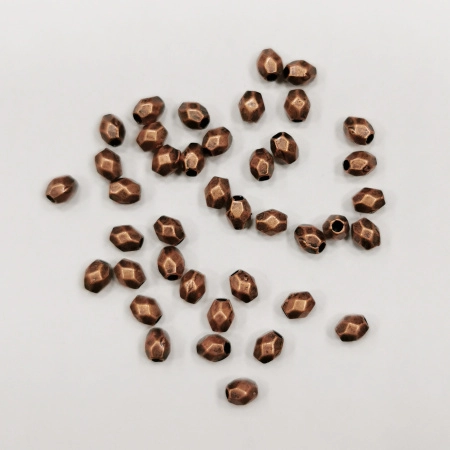 Бусина металлическая, 4х3.5мм, граненая, базовый материал - цинковый сплав, медного цвета с чернением, 5 грамм