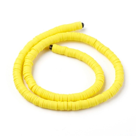 <p>Плоские круглые бусины - чипсы (диски, рондели heishi) ручной работы из полимерной глины (пластики). Бусины могут немного отличаться по форме и размеру. Оттенок может отличаться от фотографии. Цвет: желтый. Бусины довольно мягкие, гибкие, напоминают каучук. Цена за низку длиной около 43 см, около 350-400 бусин.</p>