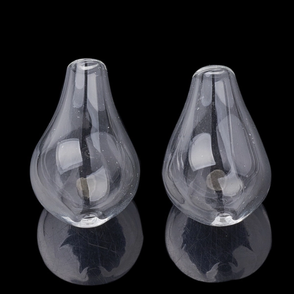 Бусина капля, 23-27х14-17мм, полая, прозрачная, стеклянная, 1 шт. <p>Стеклянная полая капля со сквозным отверстием для создания украшений. Бусины сделаны вручную, могут немного отличаться по форме и размеру. Напоминают также грушу. Длина бусин 23-27, толщина нижней части 14-17 мм, диаметр отверстия - около 1.5-2 мм. Цена за 1 шт.</p>