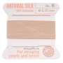 <p>Прочная нить из высококачественного натурального 100% шелка, произведена компанией Griffin (Германия). К нити прикреплена проволочная иголочка. Идеально подходит для использования с жемчугом и натуральными камнями. Толщина около 0,7 мм. Оттенок может отличаться от фотографии и в разных поставках. Цена за моток 2 метра.</p>