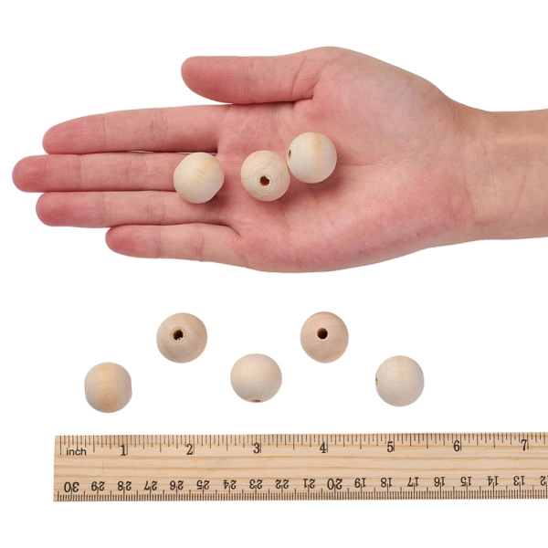 Бусина деревянная, 20х19мм, натуральная (без покрытия), 24 грамма <p>
Деревянные бусины без покрытия. Размер примерно 20*19 мм, могут немного отличаться по форме и размеру. На бусиных возможны небольшие неровности. Размер отверстия около 3-4 мм. Отлично подходят для создания слингобус, детских украшений, эко-украшений и т.д. Цена за упаковку 24 грамма (около 11-12 бусин, фасуются без проверки на дефекты).
</p>