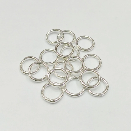 Соединительное колечко, 7мм (толщина 1.0мм, внутренний размер 5мм), неразъемное, базовый материал - латунь, серебристого цвета, 2 грамма