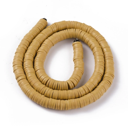 <p>Плоские круглые бусины - чипсы (диски, рондели heishi) ручной работы из полимерной глины (пластики). Бусины могут немного отличаться по форме и размеру. Оттенок может отличаться от фотографии. Бусины довольно мягкие, гибкие, напоминают каучук. Цвет: светло-коричневый (от горчичного до насыщенно бежевого в разных поставках). Цена за низку длиной около 43 см, около 350-400 бусин.</p>