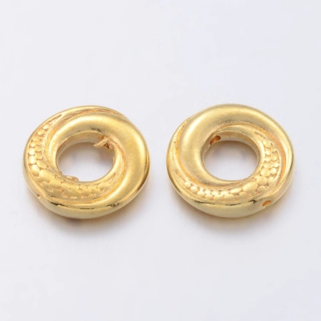 Рамка для бусин, 14.5х3мм, спиральная с пупырышками, базовый материал - цинковый сплав, золотистого цвета, 25 грамм <p>Эффектная рамка для бусин в форме слегка завитого кольца с узором "змеиная кожа". Внутренний диаметр - около 6 мм. Может также использоваться как бусина или соединительный элемент. Оттенок может отличаться от фотографии и в разных поставках. Цена за 25 грамм (около 12 шт., фасуются без проверки на дефекты).</p><p>ВНИМАНИЕ: на покрытии возможны пятнышки и пузырьки.</p>