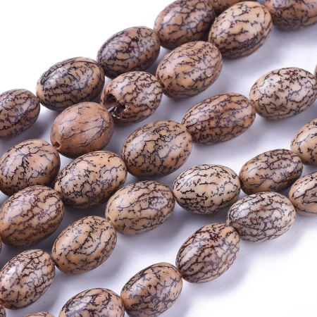 <p>Бусины из плодов бетеля, овальной формы. Могут отличаться по цвету, форме и размеру. Оттенок может отличаться от фотографии и в разных поставках. Цена за низку 40 см, около 25 бусин (низки формируются без проверки каждой бусины на дефекты).</p>